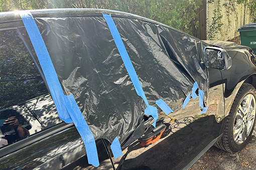 Side Window Covered with Plastic Before Riverview Car Owner Decided To Get It Replaced